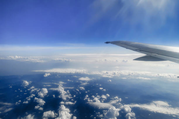 istock Traveling and Flying, Sky Above the Clouds 1174987714