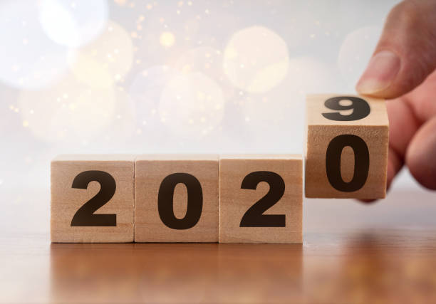 istock 2020 figure on wooden cubes 1174988027