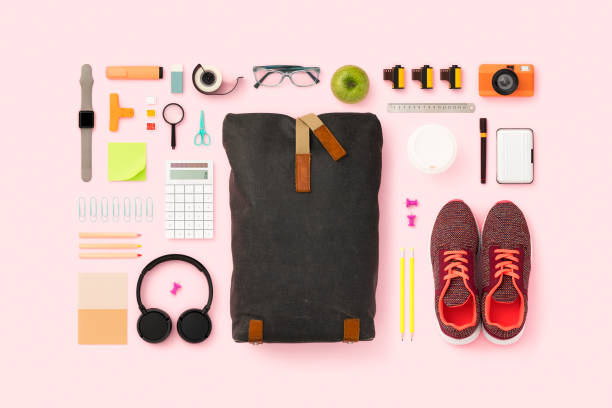 What's in my backpack flat lay School supplies and backpack flat lay. Back to school flat lay on pink background school supplies photos stock pictures, royalty-free photos & images