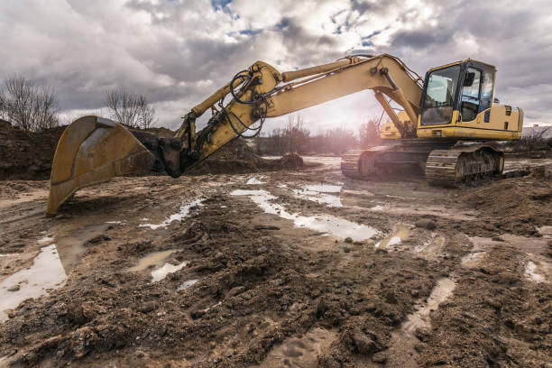 istock Excavator on a building site. Heavy machinery 1174989584