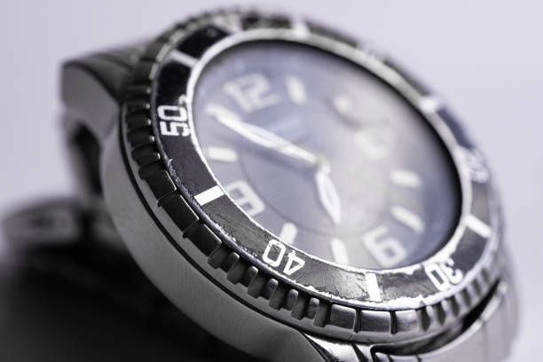 istock Diver watch case part closeup on white background. 1174993954