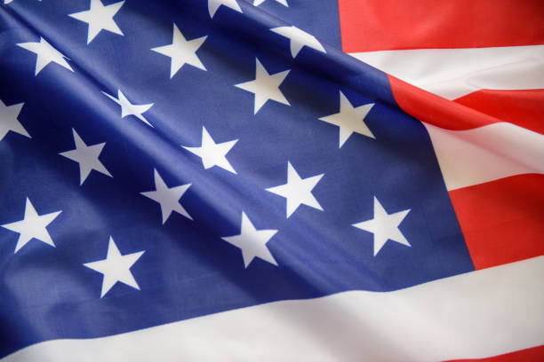 istock US American flag waving as background 1174995923