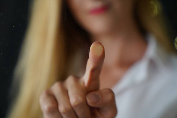 istock futuristic digital processing of biometric fingerprint scanner. 1174996245
