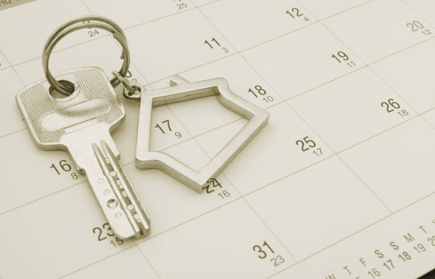 istock House key on calendar background 1174997362