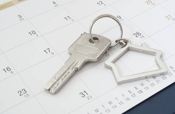 istock House key on calendar background 1174997623