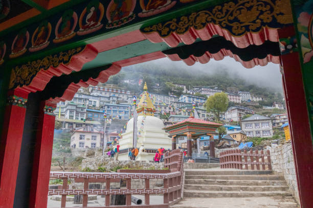 tourist walking namche bazaar village on the way to everest base camp trekking in nepal.namche bazaar is famous place with market and hotel for tourist located in khumbu area.nepal - lukla imagens e fotografias de stock
