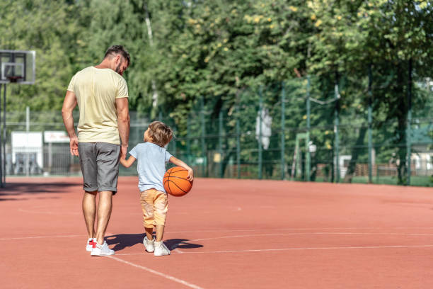 istock Father and son in summer 1175005029