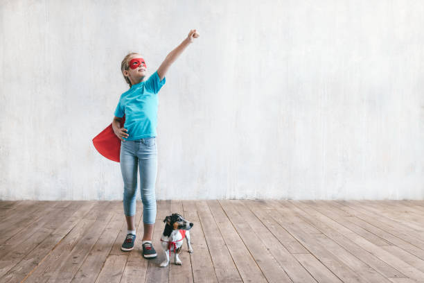 istock Flying little girl and a dog 1175005083