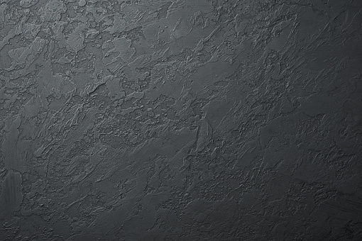 fondo de hormigón negro con textura de grietas. pizarra negra superficie vacía con espacio de copia para el diseño photo