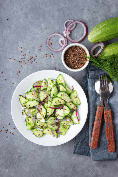 istock Fresh cucumber salad with flax seeds. 1175006229