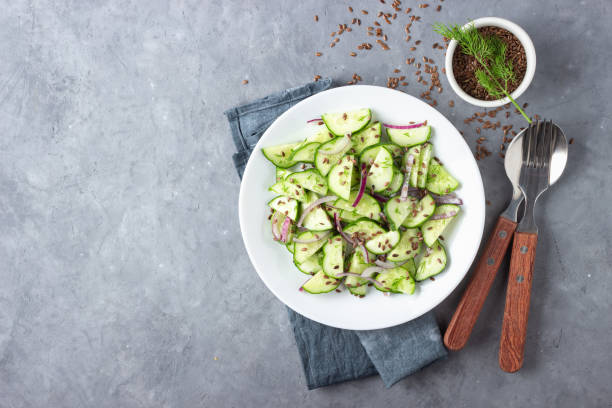 istock Fresh cucumber salad with flax seeds. 1175006252