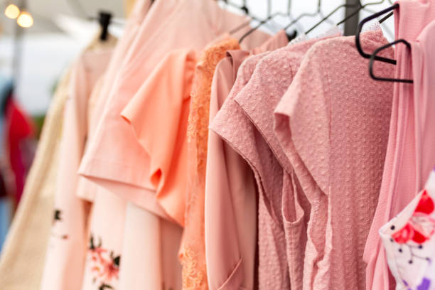 istock Racks with clothes outdoors. Designer sells clothes at a city fair 1175009098