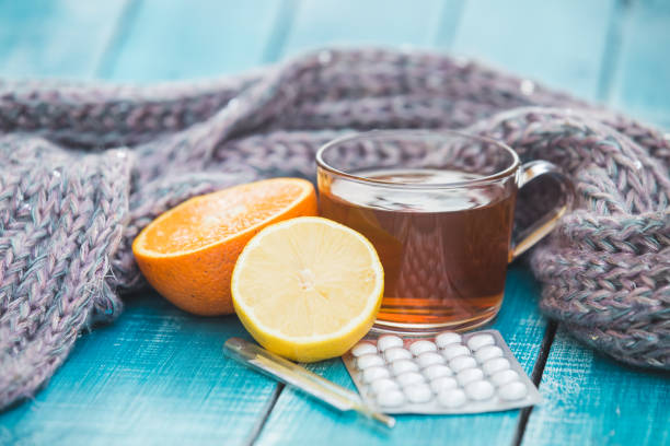 istock Cold and allergy pills and tea remedy 1175009593