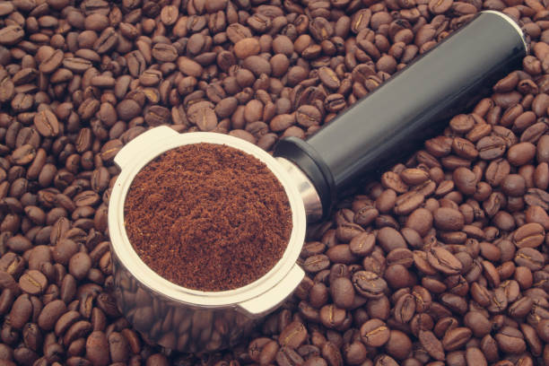 istock Ground coffee in coffee maker portafilter and coffee beans 1175009632