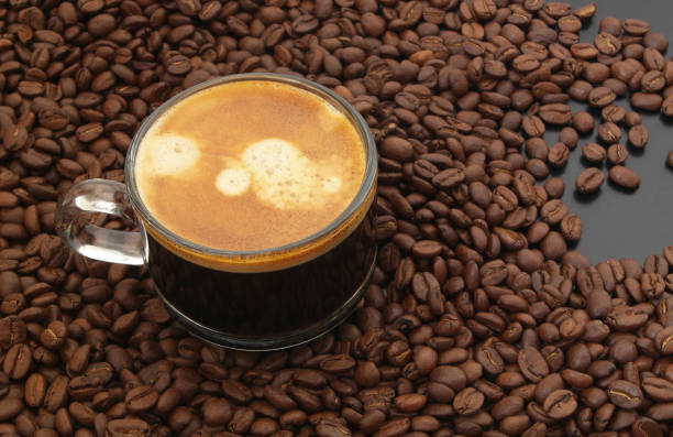istock Espresso coffee on coffee beans background 1175009863