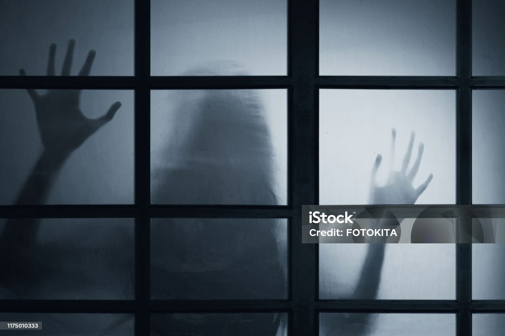 Shadow of scary ghost woman Women Stock Photo