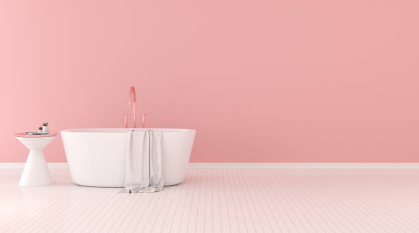 vista de bañera con mesa auxiliar y toalla, diseño interior moderno con pared en color pastel. renderizado 3d - colores para tu baño fotografías e imágenes de stock