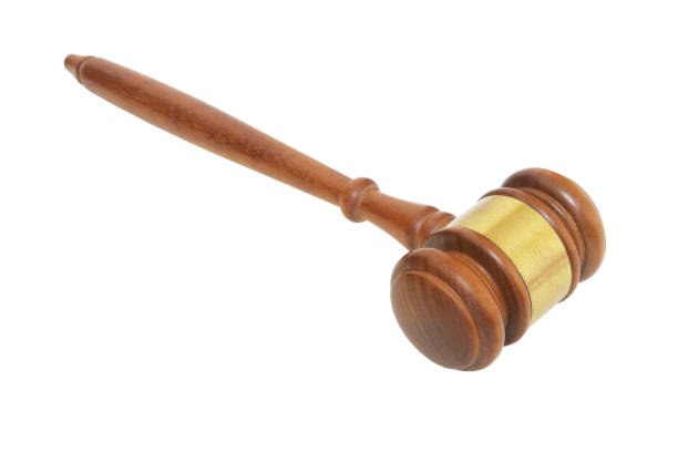 istock Judge gavel isolated on white 1175016599