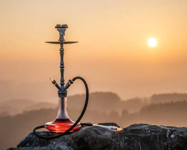 Photo of Hookah during a sunset