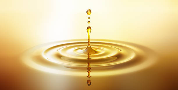 moisturizing cosmetic oil drop with ripples - oil imagens e fotografias de stock