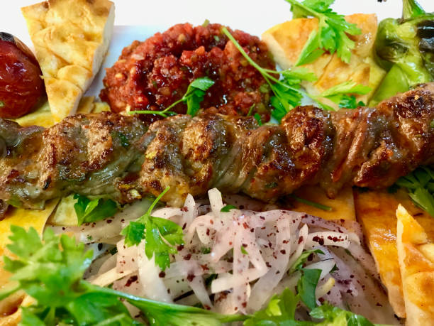 istock Turkish Adana / Urfa Kebab Topkapi and Pide Lavash served with Kebap Plate at Restaurant. 1175017925