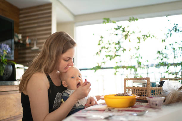 mother and daughter sitting ready to eat at a restaurant