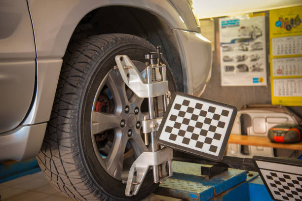istock wheel aligner mounted on a car wheel 1175018973