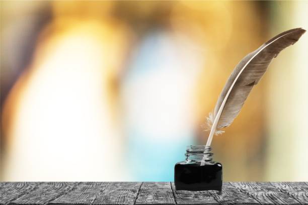 istock Quill pen with inkwell. 1175019489