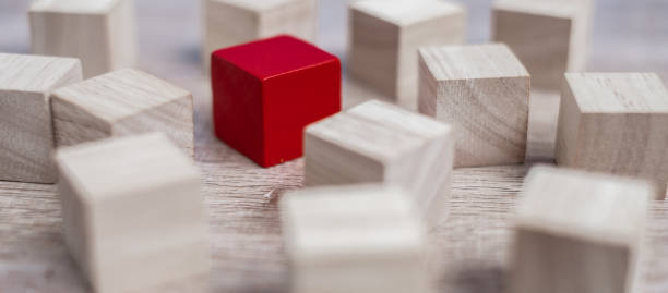istock Red cube block different from crowd of wood blocks. Unique Leader, strategy, independence, think different, business and success concept 1175019713