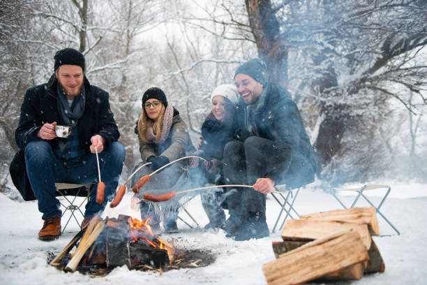 istock Friends having barbecue on a snowy day 1175020828