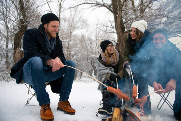 istock Friends having barbecue on a snowy day 1175020940