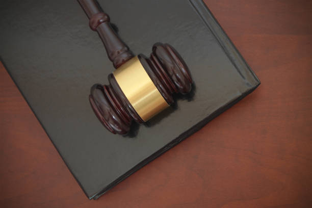 istock Judge gavel and legal book on table 1175021044