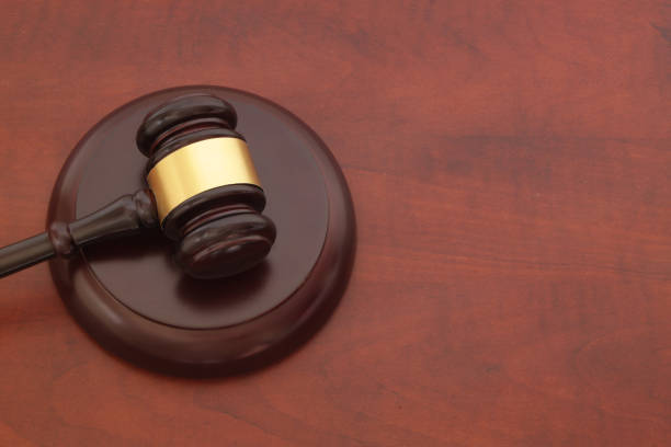istock Judge gavel on brown table 1175021775