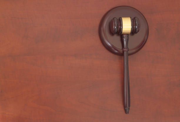 istock Judge gavel on brown table with copy space 1175021997