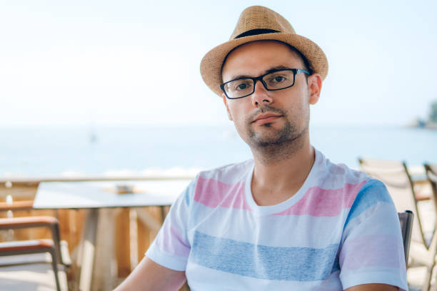 istock Sitting at seaside cafe 1175022798