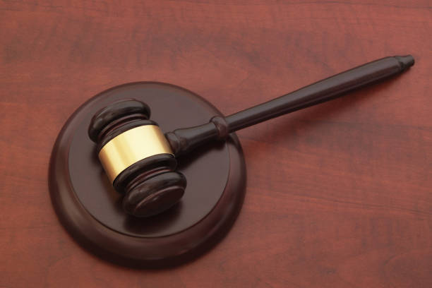 istock Judge gavel on brown table 1175022923
