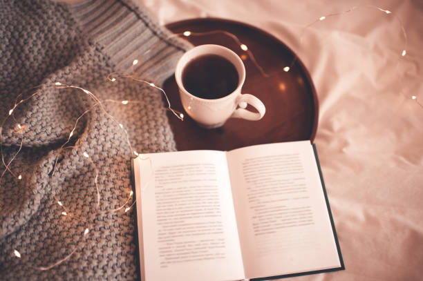 istock Cup of te with book 1175024528