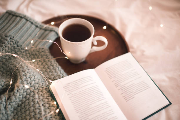 istock Cup of te with book 1175024594