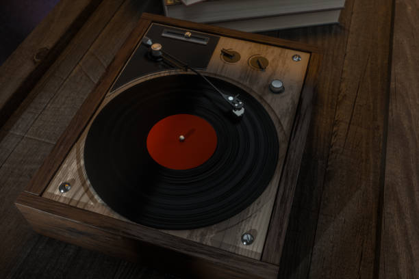 istock The old wooden vinyl record player on the table, 3d rendering. 1175024622