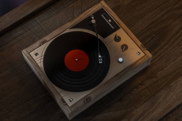 istock The old wooden vinyl record player on the table, 3d rendering. 1175024726
