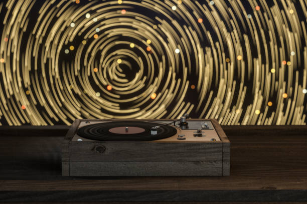istock The old wooden vinyl record player on the table, 3d rendering. 1175024772