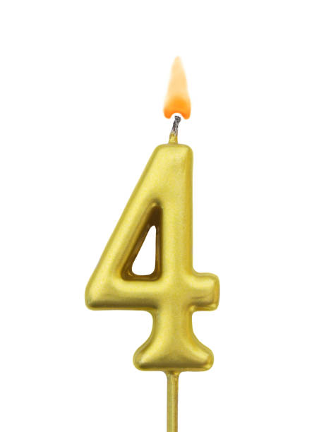 istock Golden birthday candle isolated, number 4 1175025229