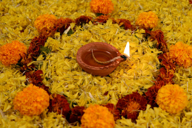 istock Diwali Diya with marigold flowers and gift boxes 1175025422