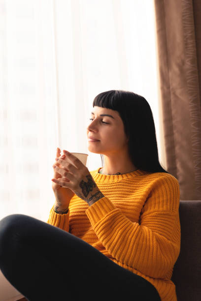 istock Young women relaxing at home 1175026662