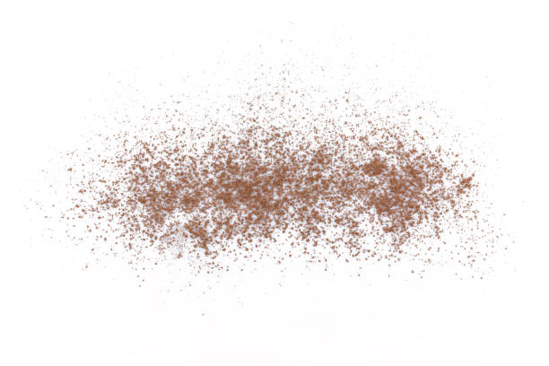 pile cocoa powder top view on white background.