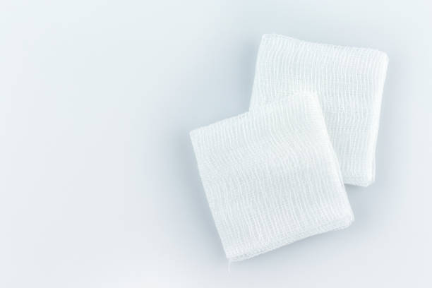 gauze pads on white background. gauze pads on white background. gauze stock pictures, royalty-free photos & images