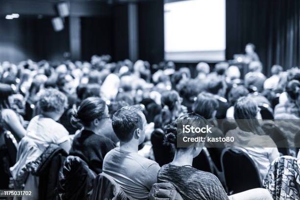 Speaker Giving Presentation On Scientific Business Conference Stock Photo - Download Image Now