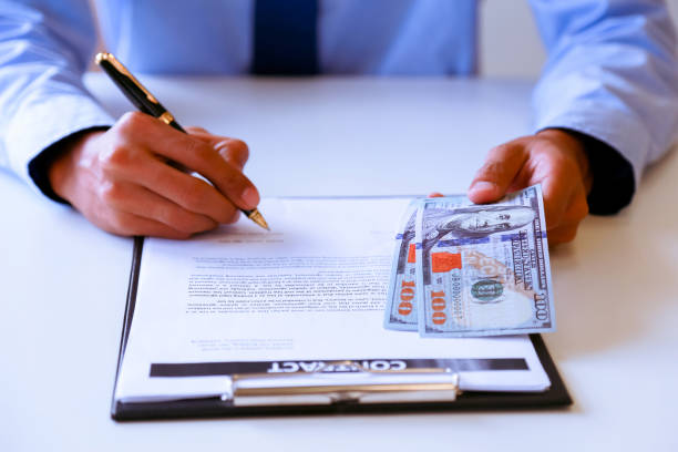 istock Businessman signs a contract. 1175032474