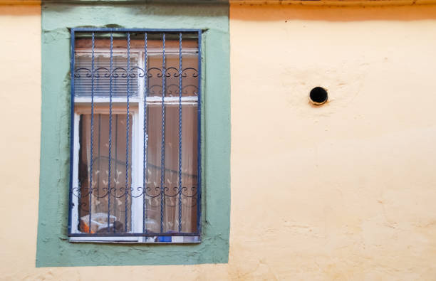 istock Window and hole on facade of Old House. 1175036624