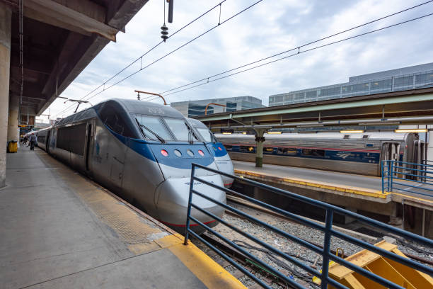 AMTRAK train are waiting for tourists at Union Station in Washington DC, USA. AMTRAK train are waiting for tourists at Union Station in Washington DC, USA. Amtrak stock pictures, royalty-free photos & images